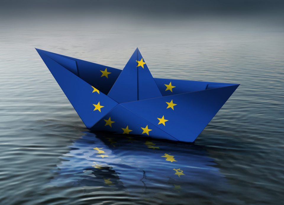 An European flag paper boat on the water. The Future of Europe Concept Graphic