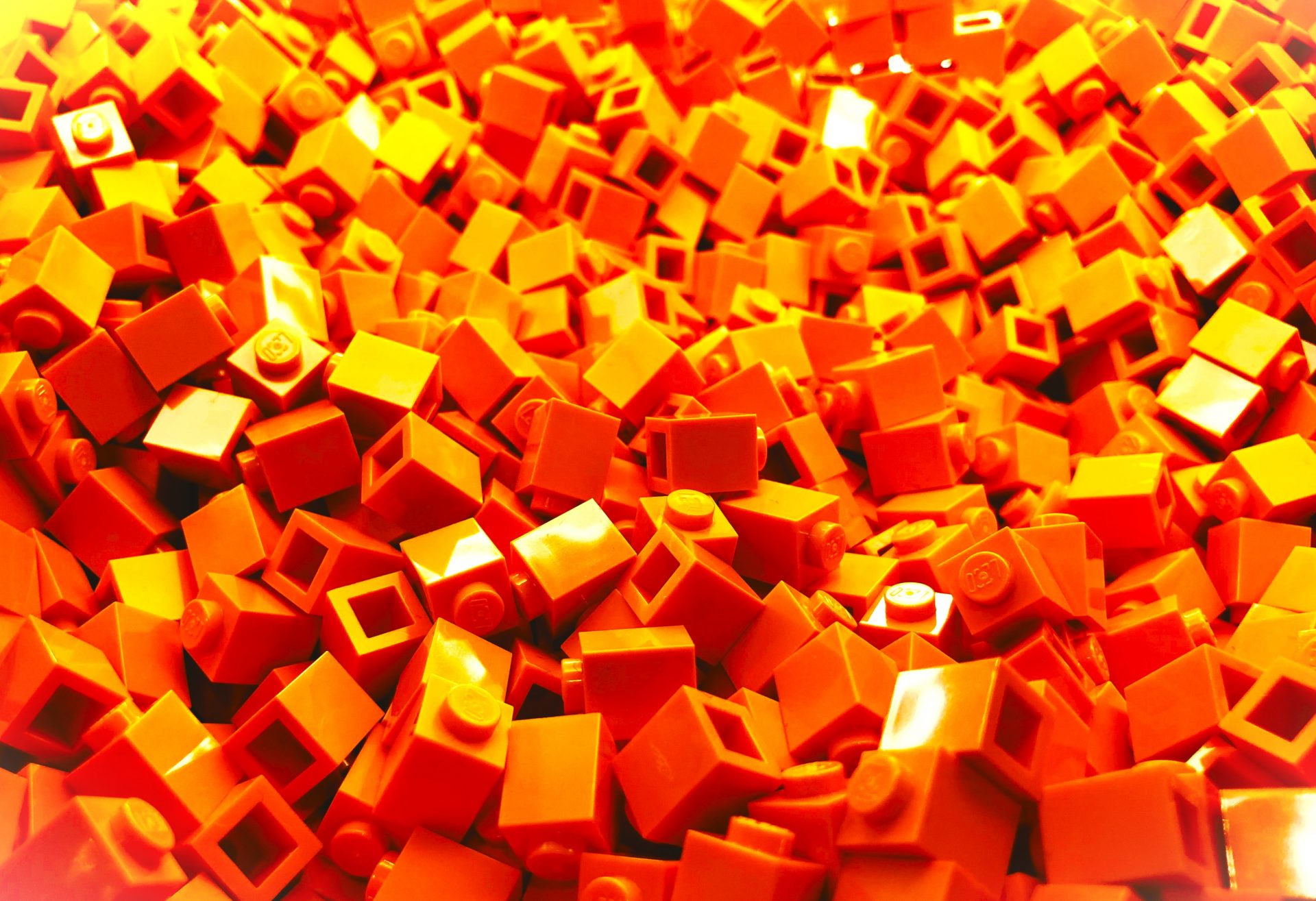 Multiple orange lego pieces