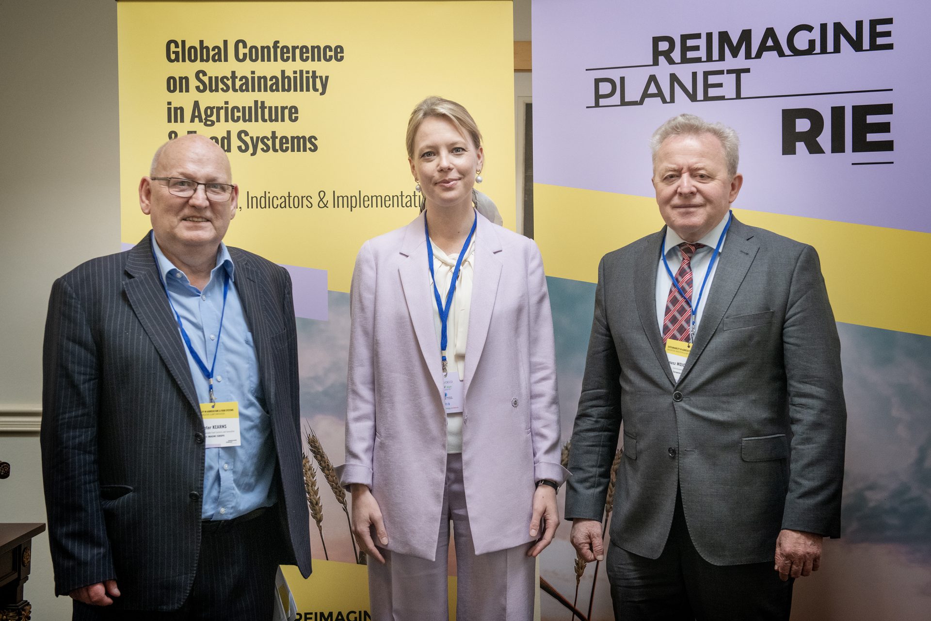 Dr Peter Kearns, Erika Staël von Holstein and the European Commissioner Janusz Wojciechowski posing for a photography